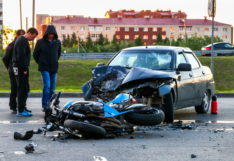 Car and motorcycle accident scene