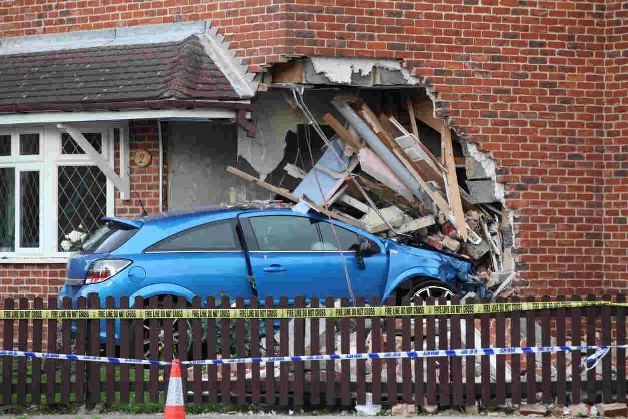 SUV Crashes Into Building